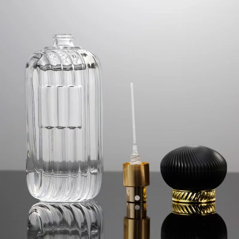 product image 100ml Unique Shape Clear Glass Perfume Spray Bottles SK-PGB100B