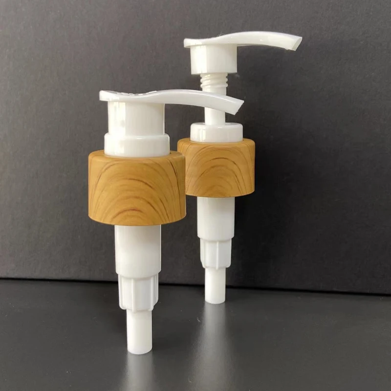 Factory Personal Care Non Spill 24/410 Water Transfer Printing PP Lotion Pump with Wood Grain Pattern 